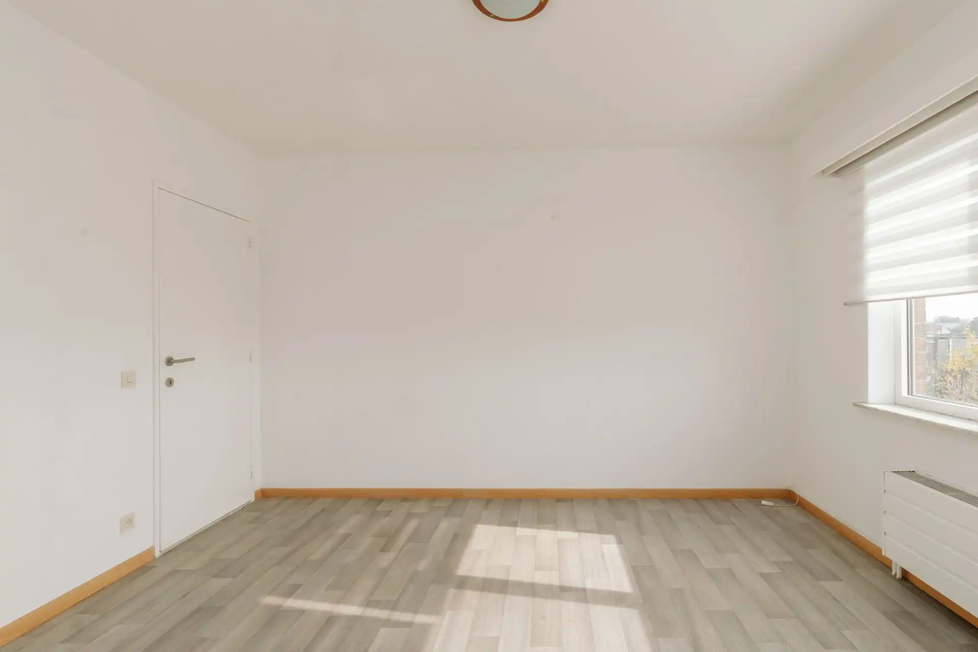 Lichtrijk appartement met 2 slaapkamers & staanplaats foto 11