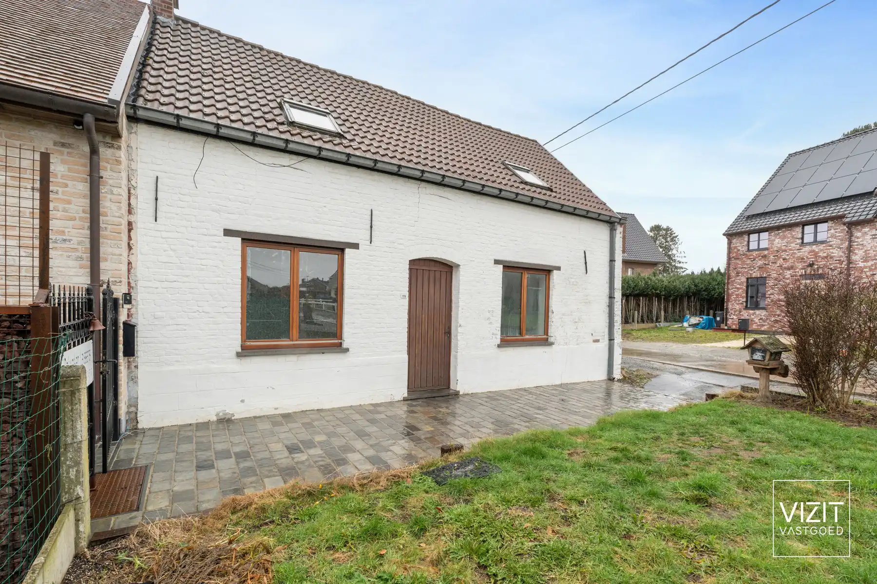 Rustig gelegen halfopen woning met tuin in Meerbeke foto 2