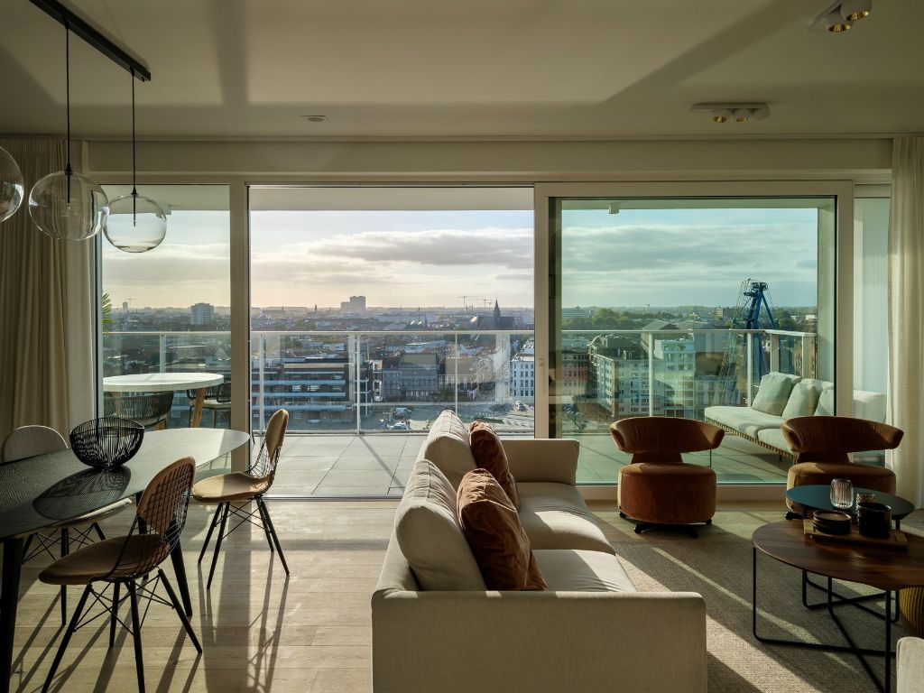 Luxe appartement (BJ 2020) met een adembenemend zicht over het water en de stad. foto 7