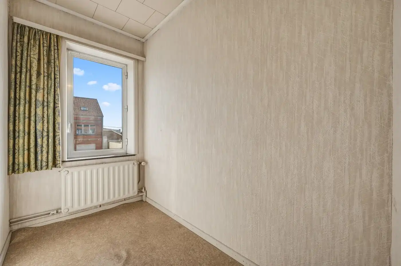 Charmante rijwoning met 2 slpk, tuin en parking foto 19