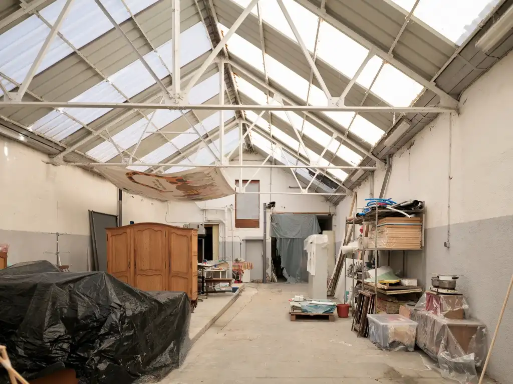 Opbrengsteigendom met magazijn en twee appartementen nabij Gent foto 18