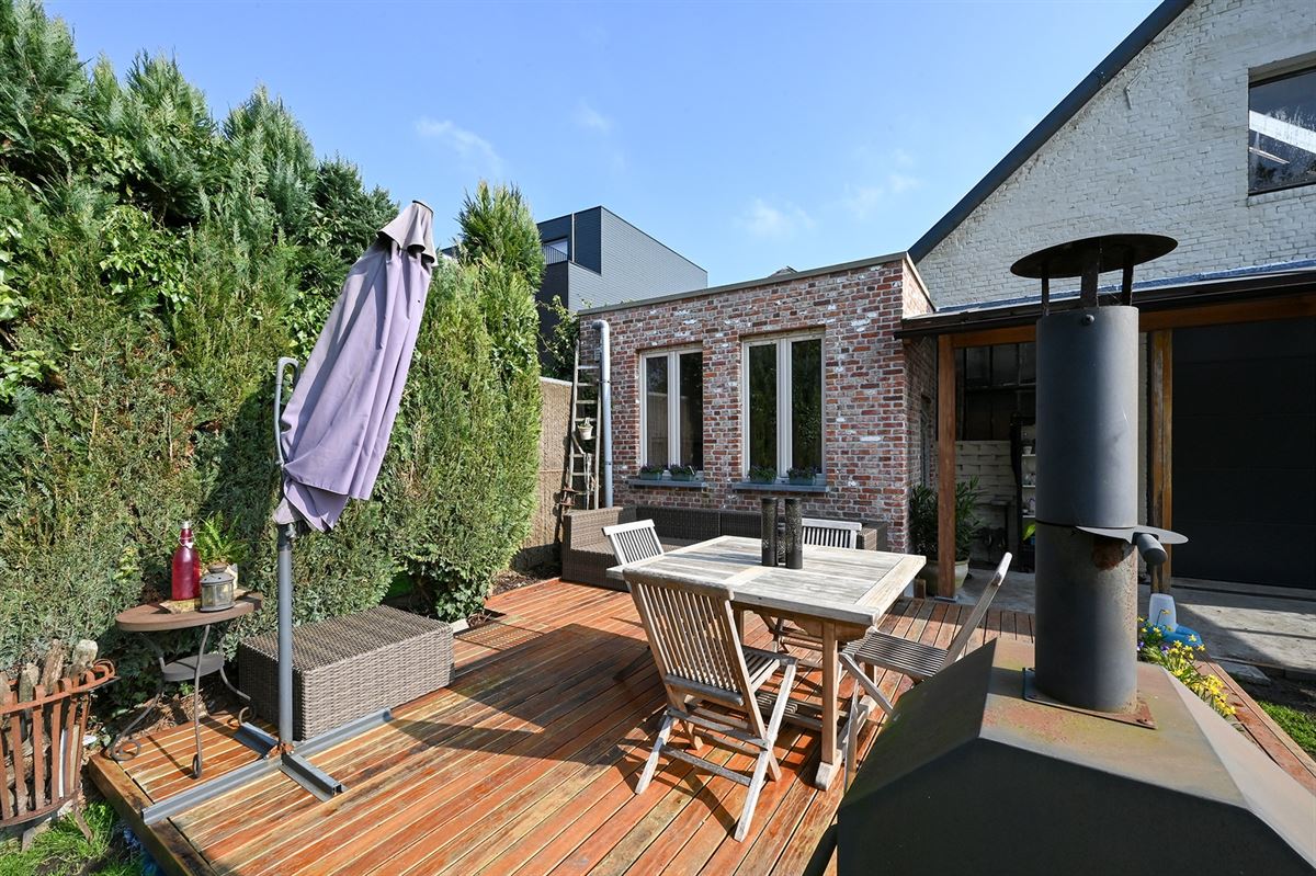 Ruime woning met zéér grote garage en leuke tuin foto 28