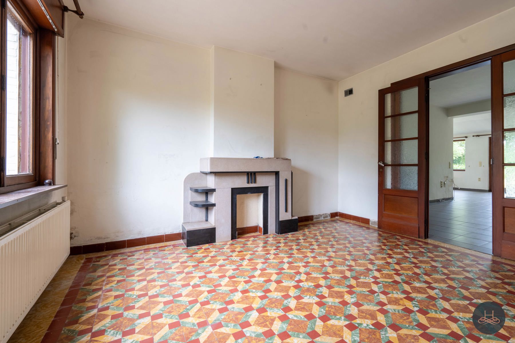 Achterliggende gezinswoning op rustgevend perceel foto 5