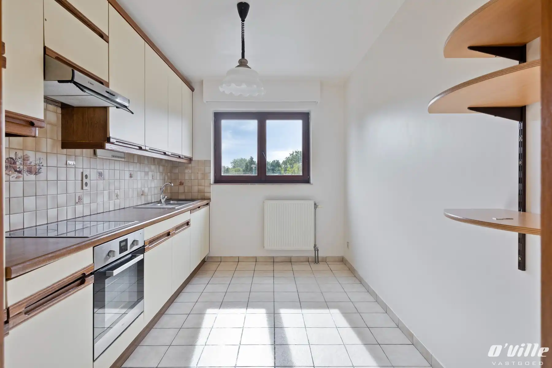 Gezellig en instapklaar 2-slaapkamerappartement met garagebox foto 9