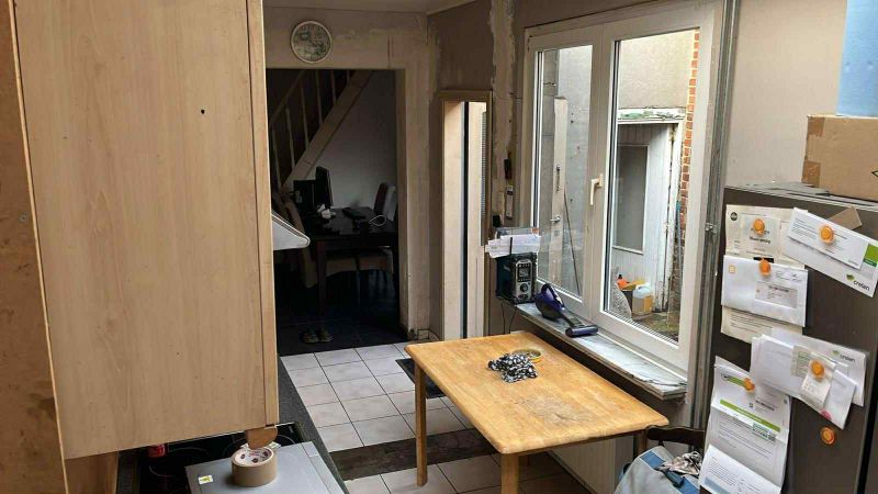 Te renoveren starterswoning met ruime tuin foto 5