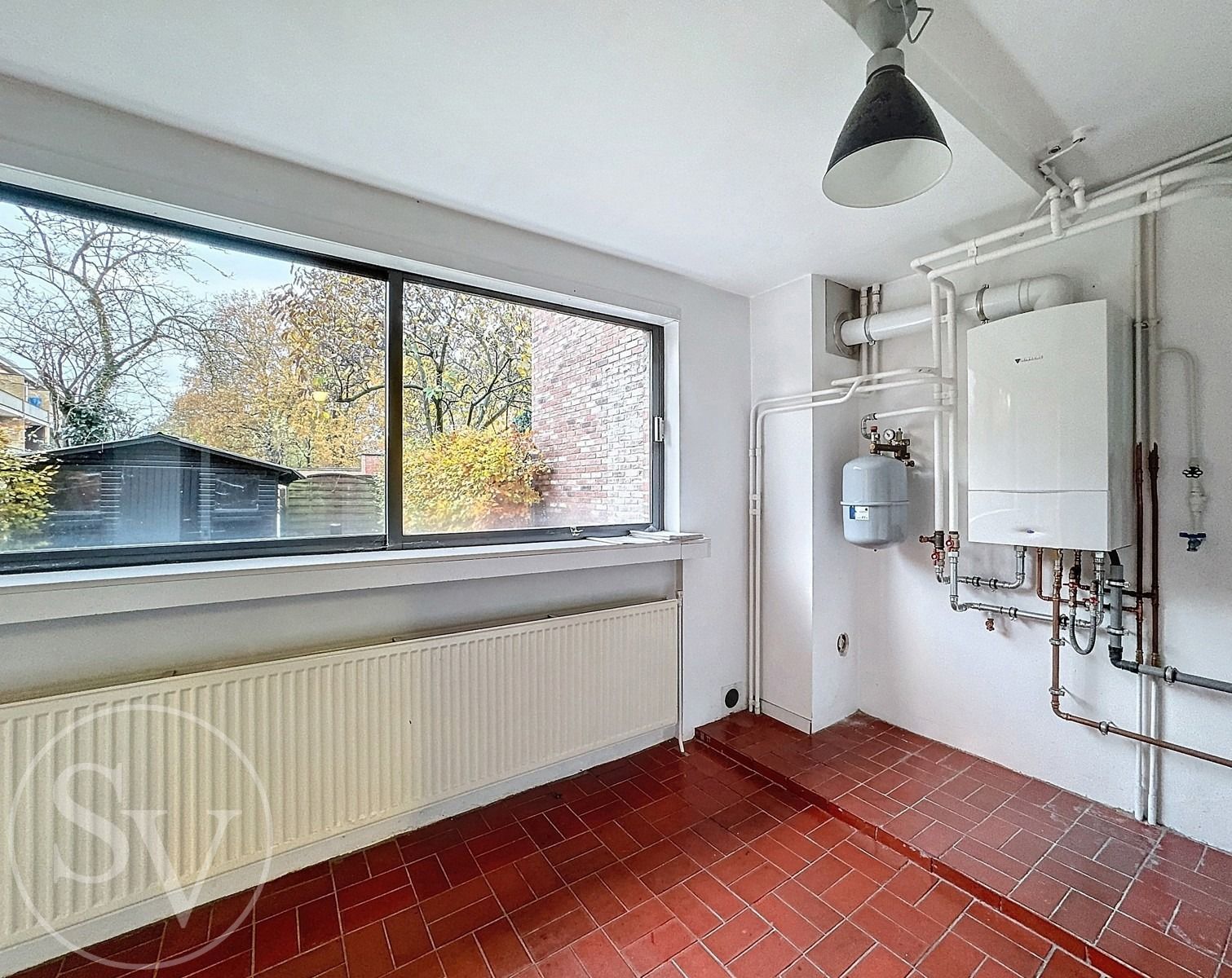 Bel-etagewoning met 4 slaapkamers en tuin. foto 19