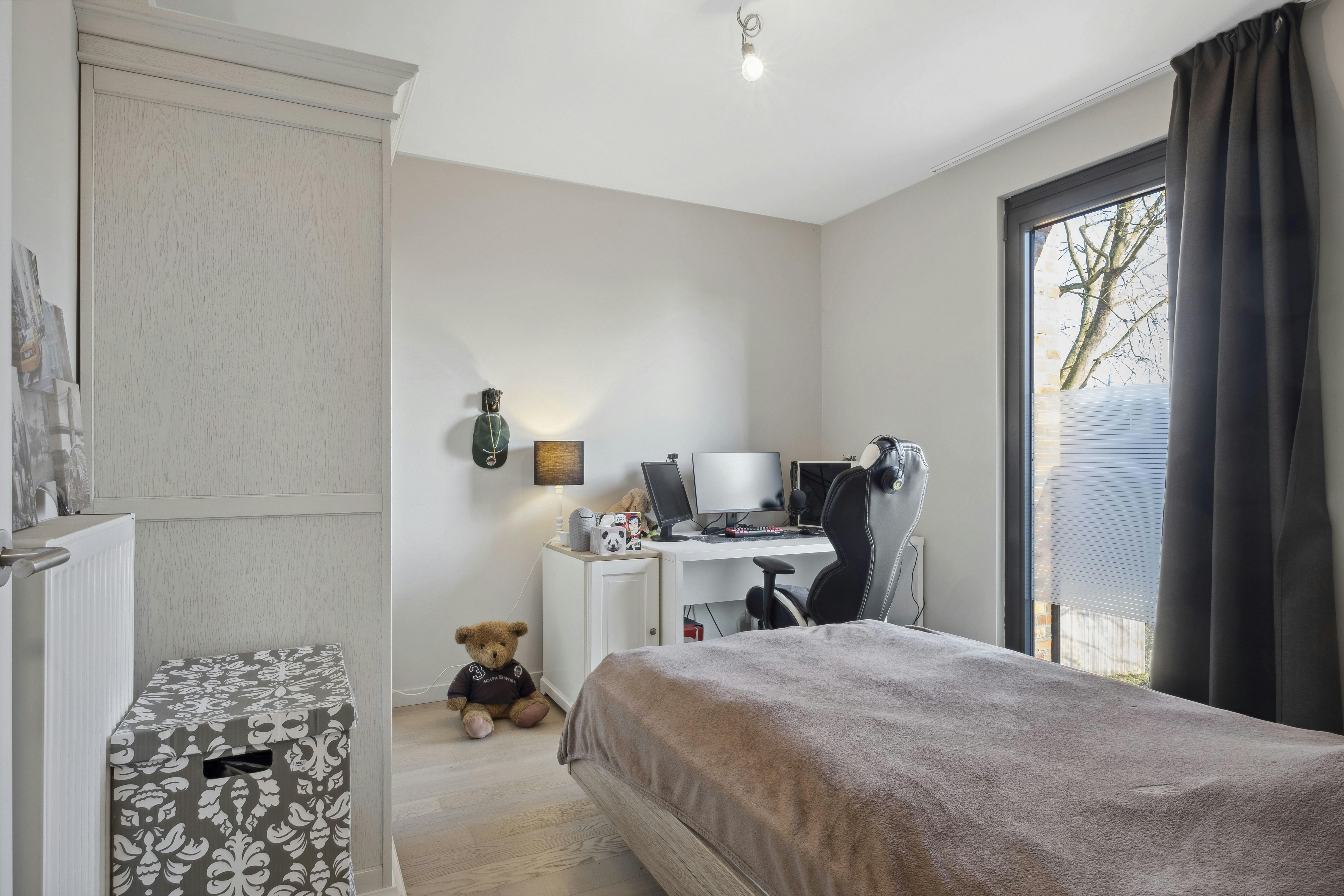 Stijlvol appartement met 2 slaapkamers en 2 autostaanplaatsen foto 10