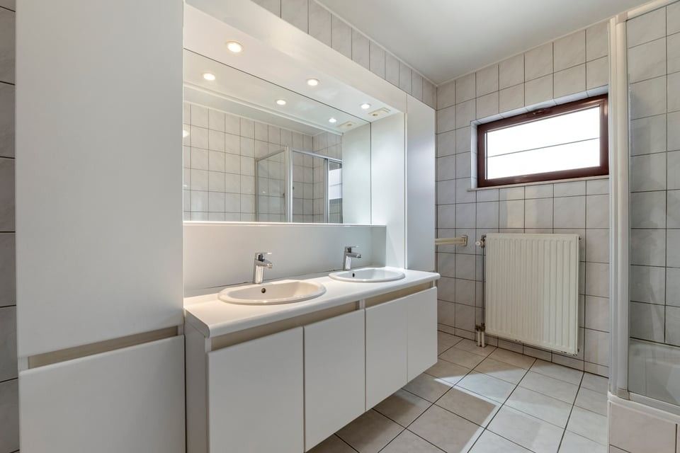 RUIM APPARTEMENT MET UITZONDERLIJK TERRAS VAN +50M² IN SINT-TRUIDEN foto 27