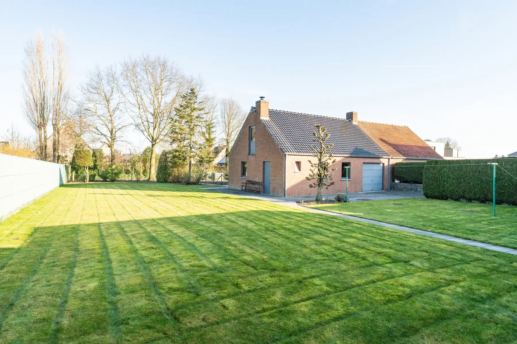 Verzorgde woning met ruim bijgebouw op perceel van 1.369 m² foto 21