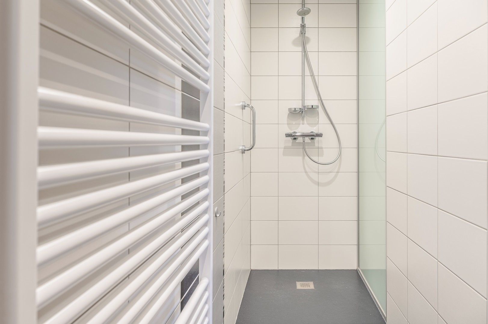 Instapklaar gelijkvloers appartement met tuin + optioneel een garage box! foto 17