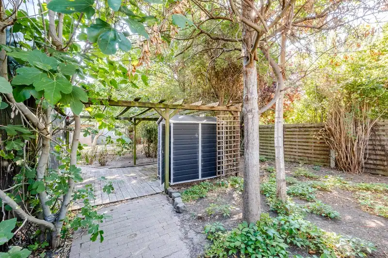 Op te frissen woning met perceel bouwgrond foto 22
