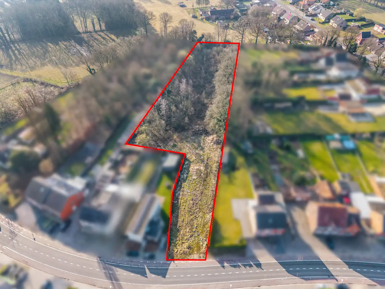 Bouwgrond op 9a 68ca + optie weide op 58a 40ca nabij centrum foto {{pictureIndex}}