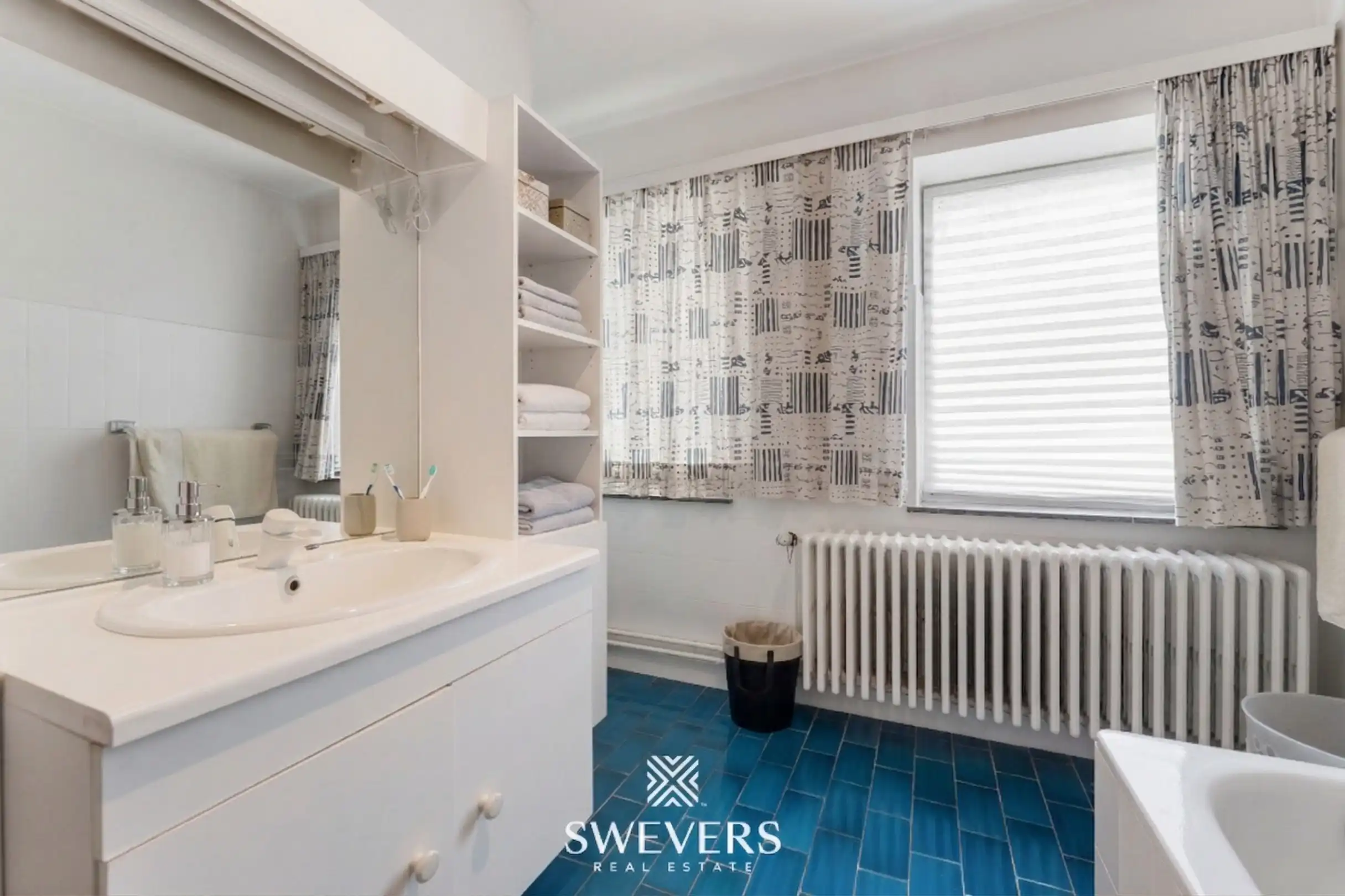 Ruime halfopen bebouwing met 4 slaapkamers en veel renovatiepotentieel op topligging in Hasselt foto 18