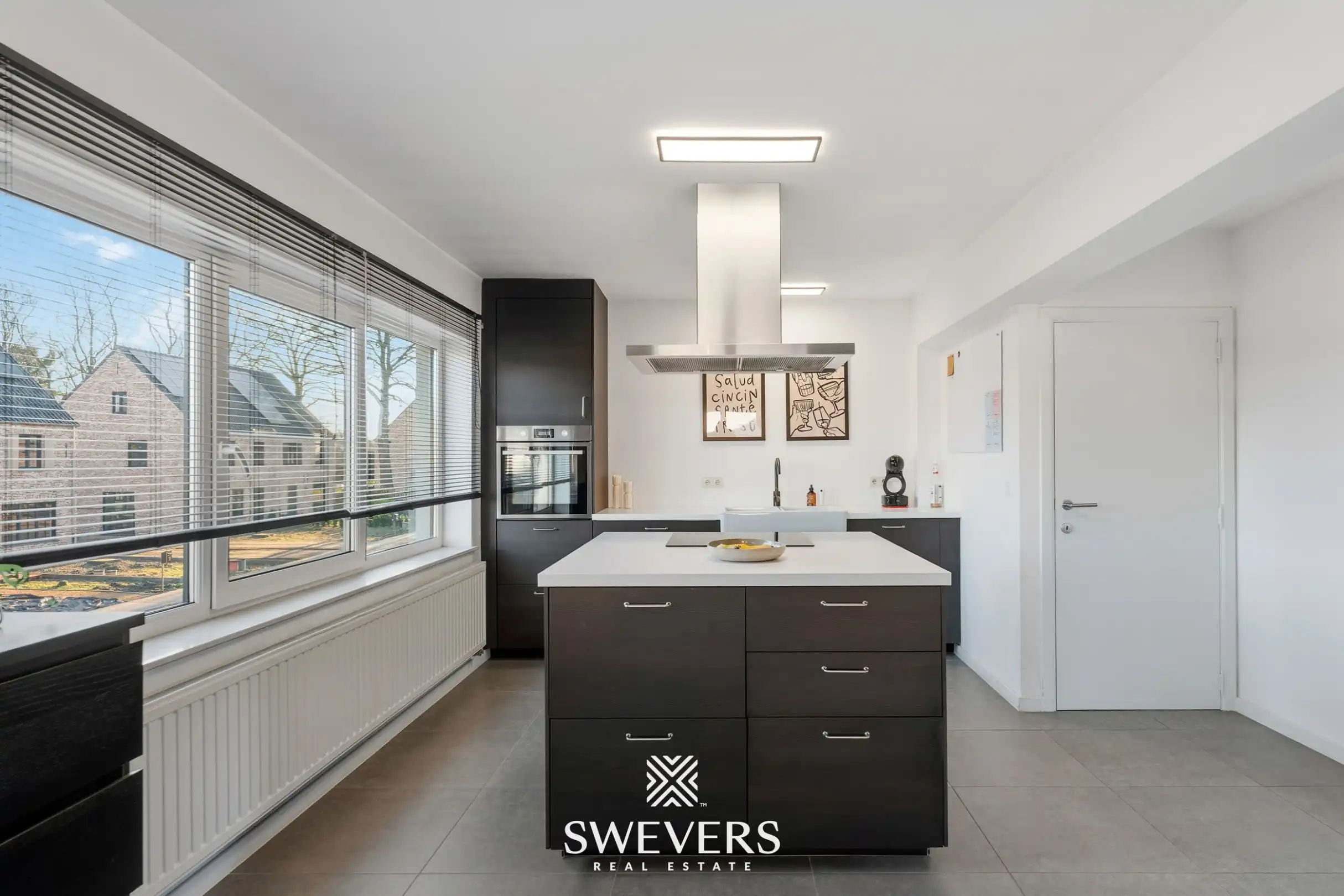 Gerenoveerd appartement met terras op topligging in Diepenbeek foto 9