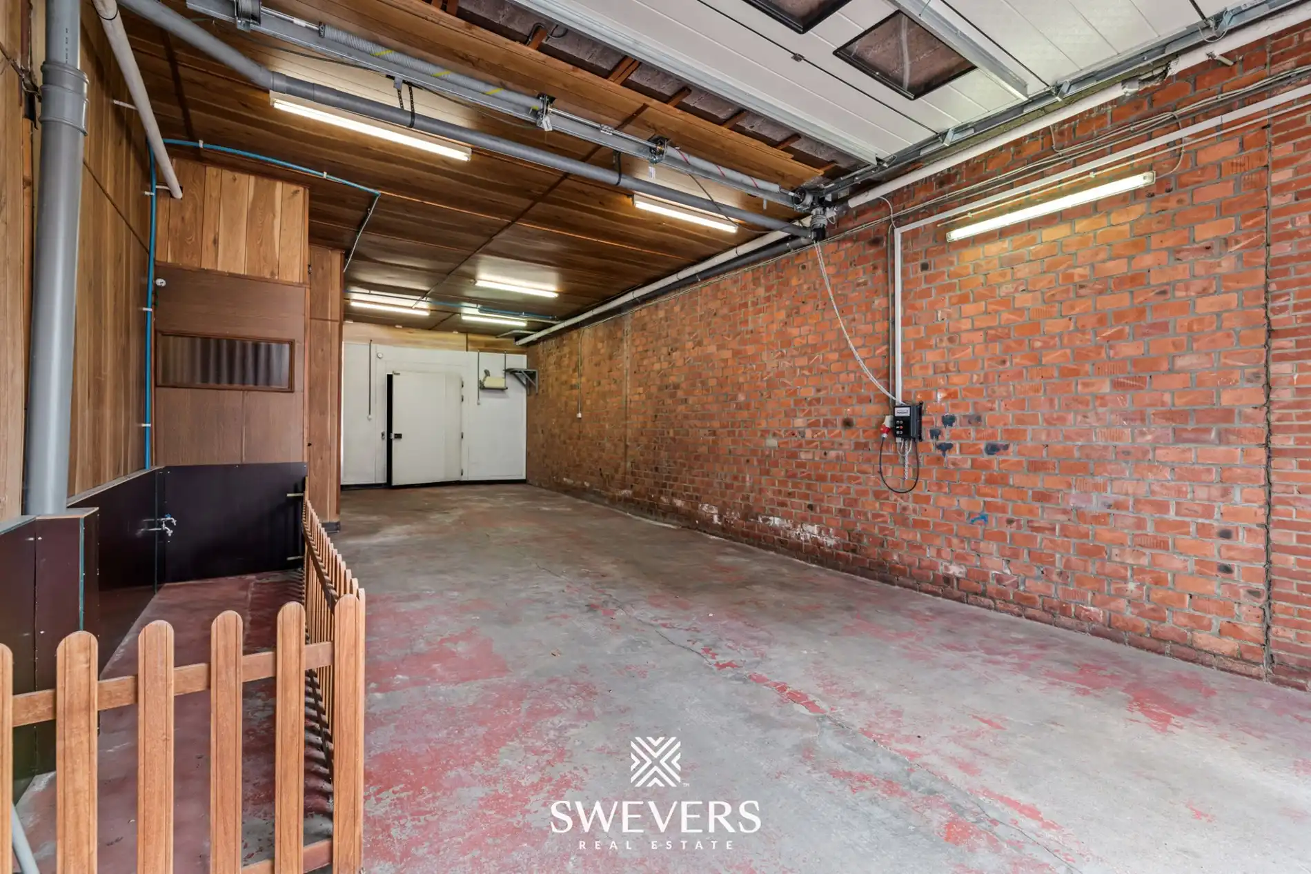 223 m² woonruimte met uitzonderlijke garage van ca. 100 m² nabij centrum foto 16