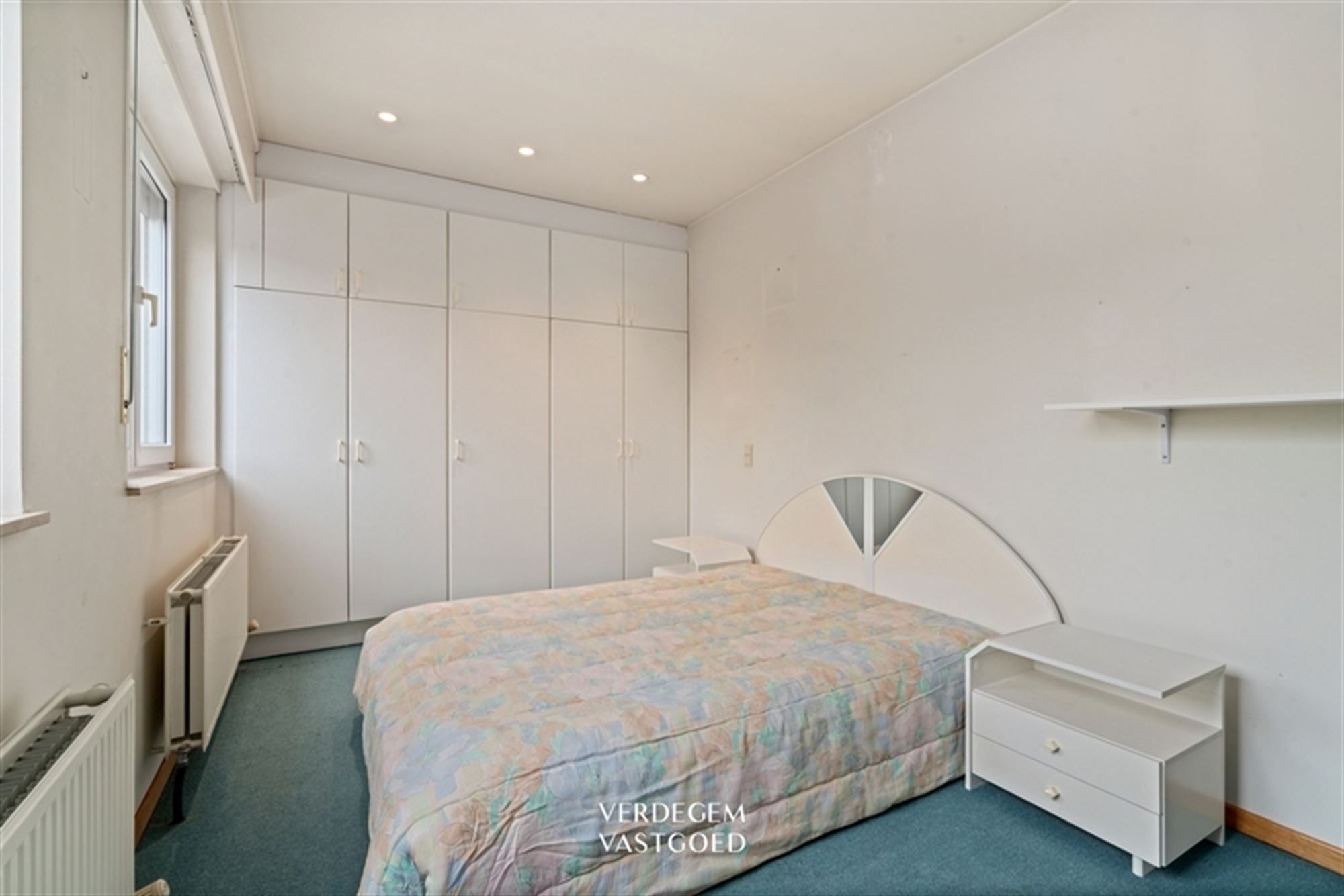 Unieke opbrengsteigendom met 4 entiteiten: handelsruimte, twee 1 slpk-appartementen en grote woning foto 24