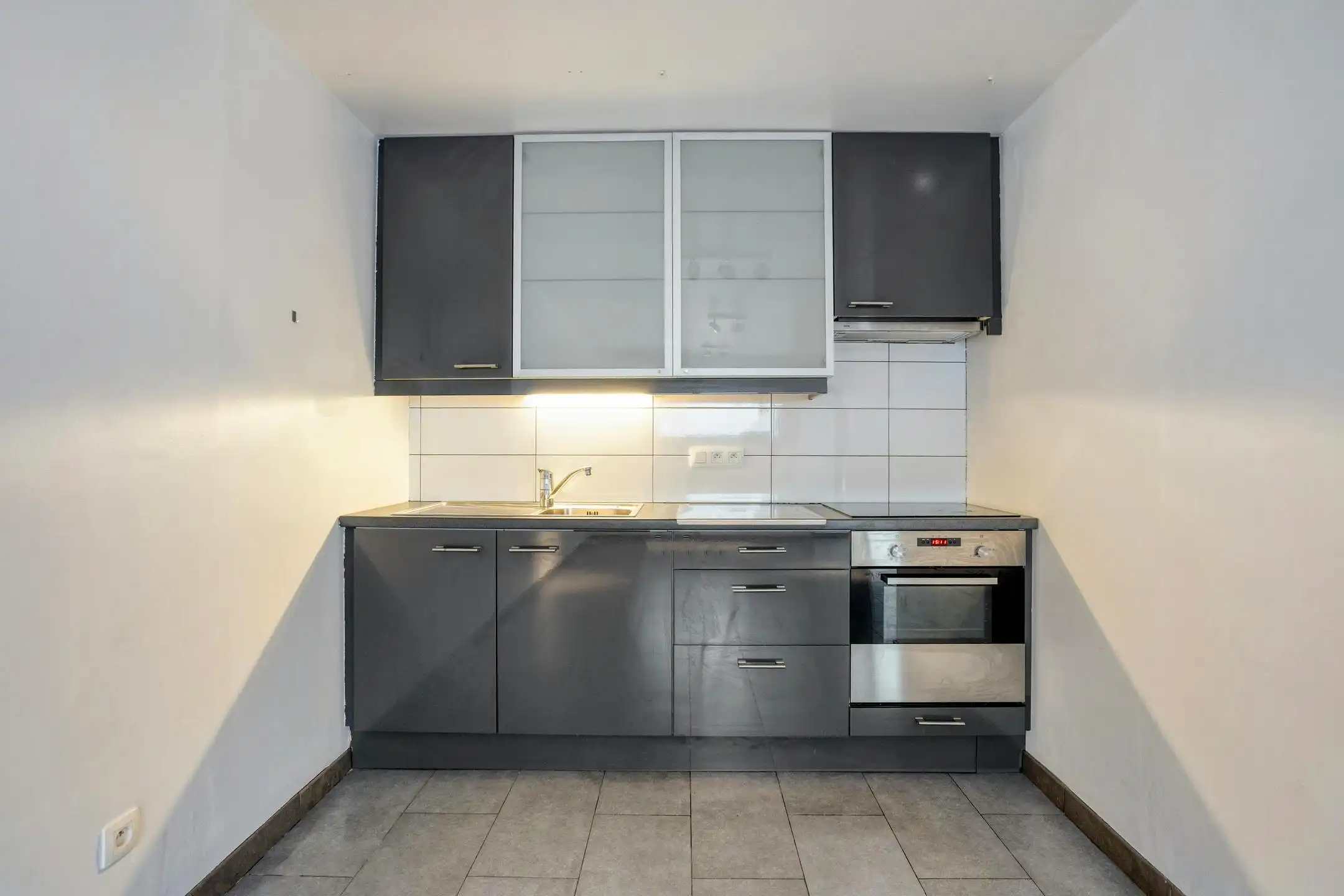 Driegevelwoning met extra studio/kantoor of praktijk, op een toplocatie in het centrum van Grimbergen! foto 17