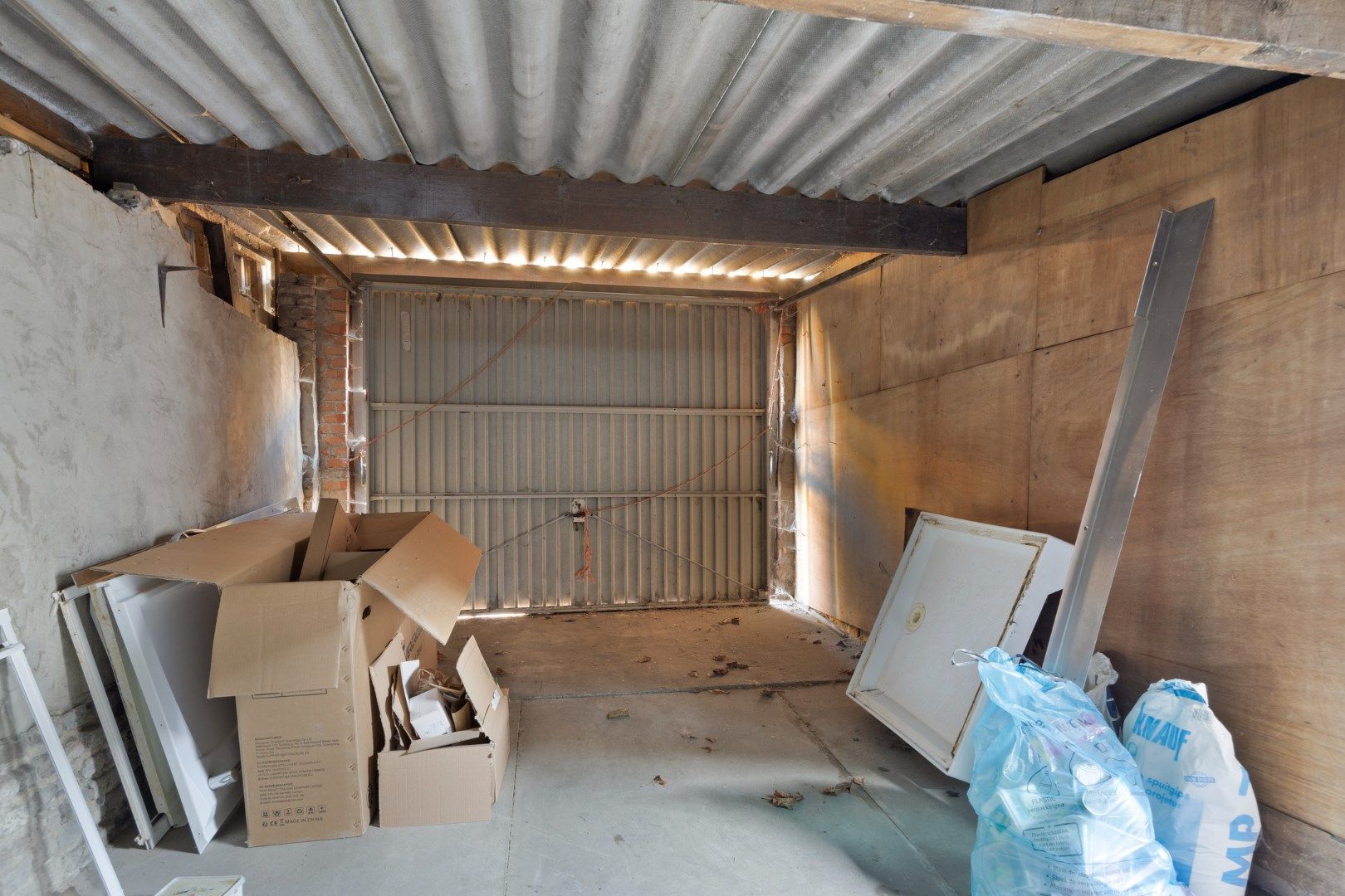 Te renoveren woning nabij het centrum van Mol ! foto 21