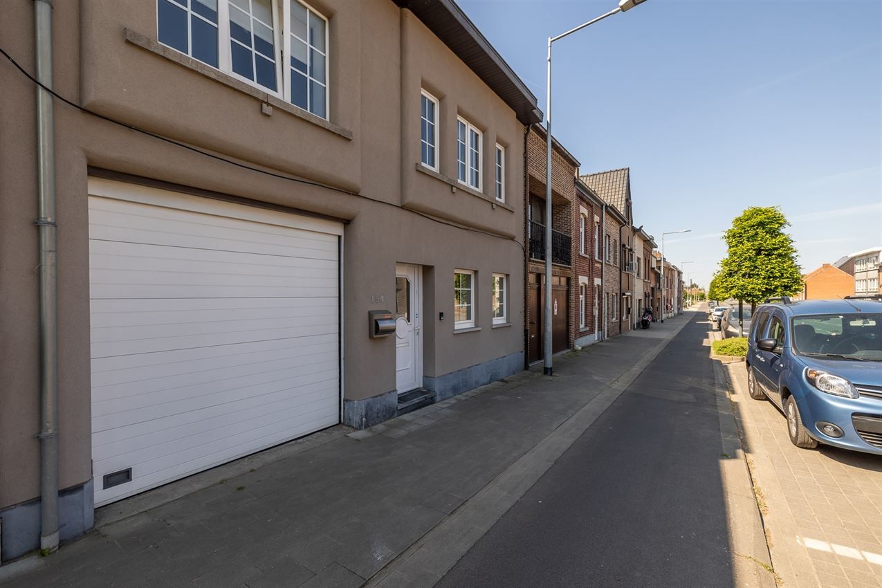Stadswoning met 3 slpk., tuin en garage foto 2