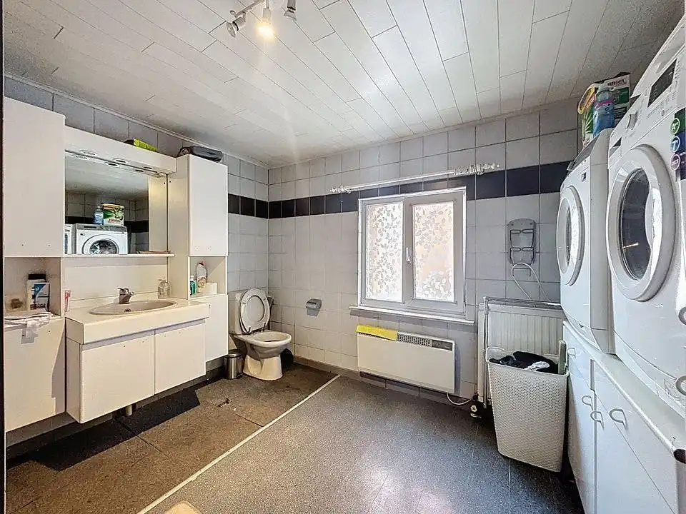 Ruime gezinswoning met diepe tuin in centrum Wuustwezel foto 14