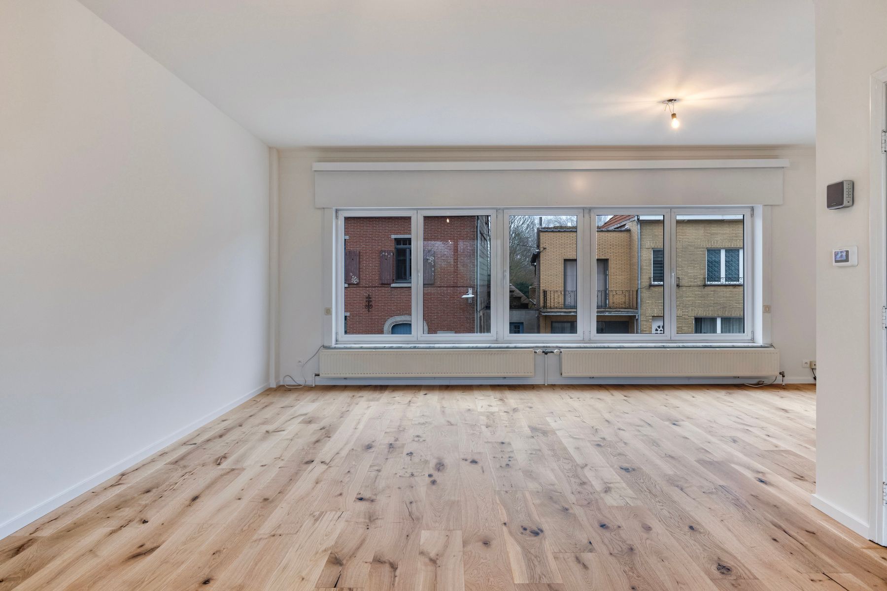 Instapklare woning met 3 slpk, garage en tuin! foto 8