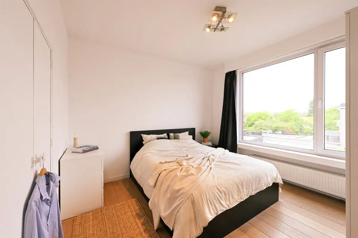 Supergezellig lichtrijk hoekappartement met 2 slpk foto 12