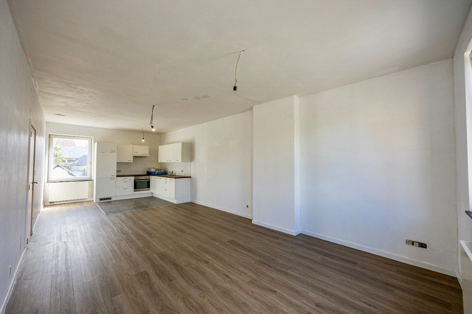 Veelzijdige opbrengsteigendom met café, appartement en topligging in Dworp foto 17