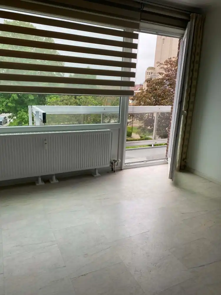 Te Huur – Goedgelegen 2-slaapkamerappartement met terras en garagebox foto 8