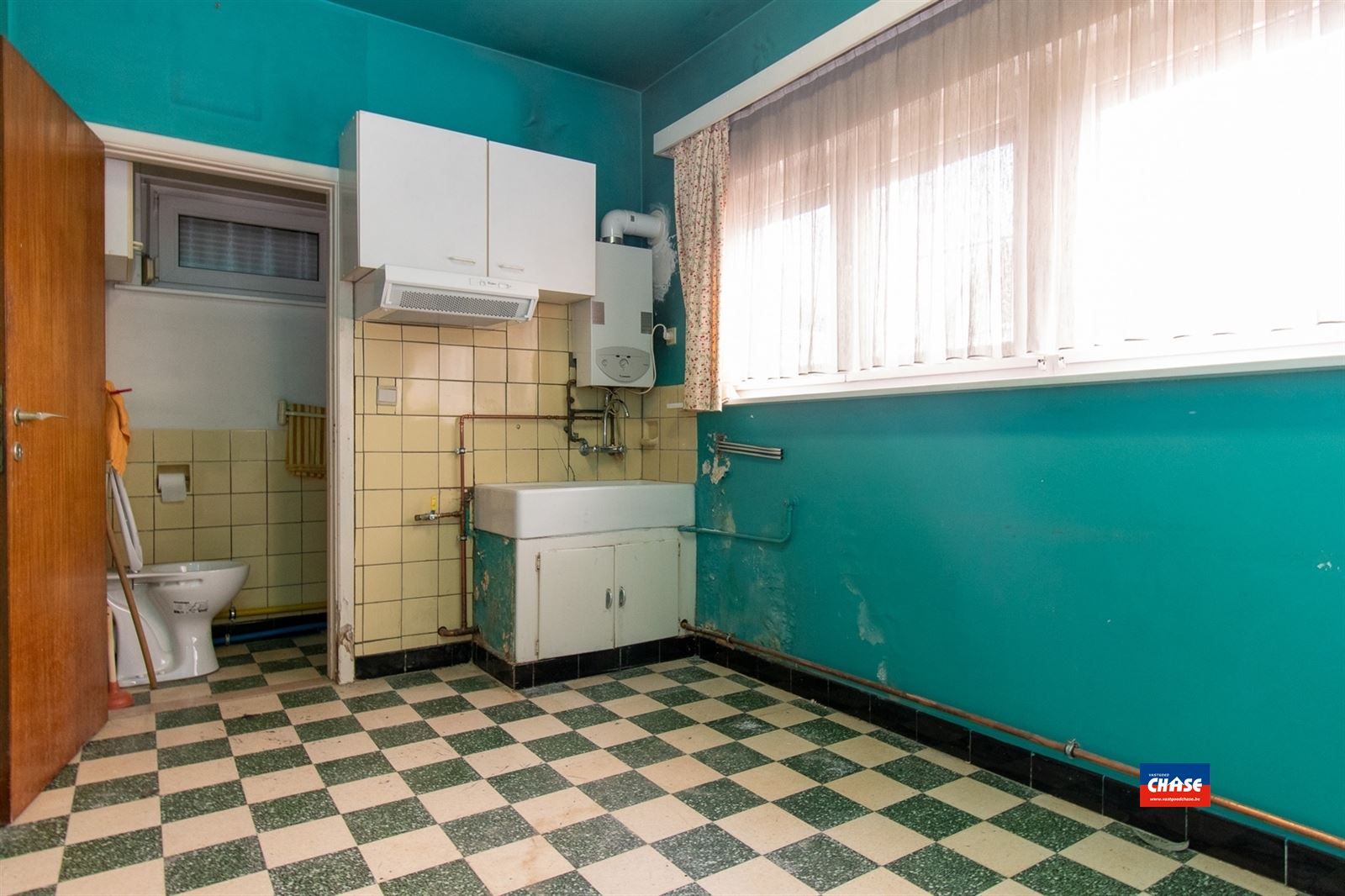Te renoveren HOB met 2 slpks, tuin en garage foto 9