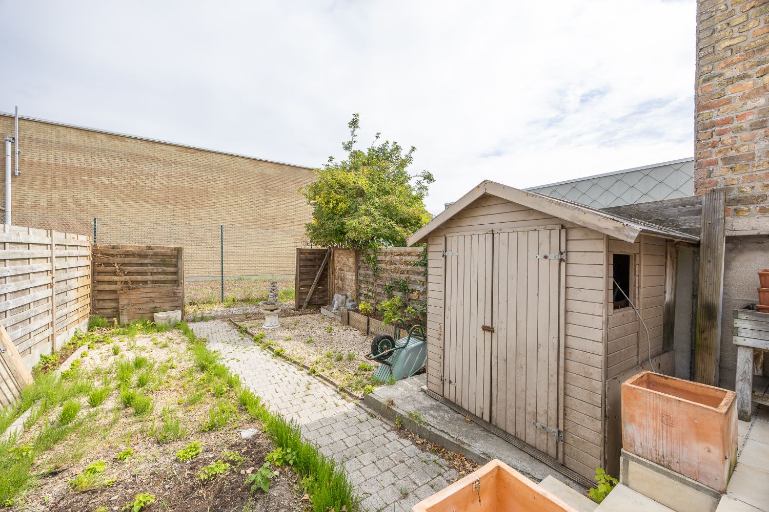 Ruime te renoveren woning met zonnige tuin en tal van mogelijkheden. foto 21