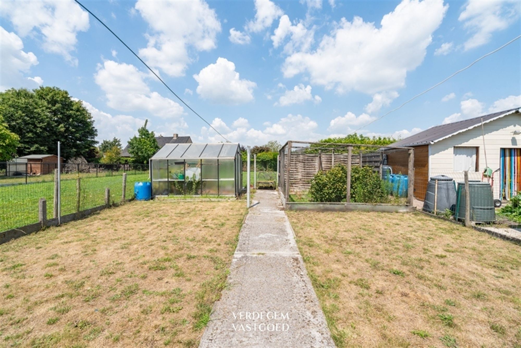 Jaren '60 woning met 4 slaapkamers, garage en leuke tuin foto 17