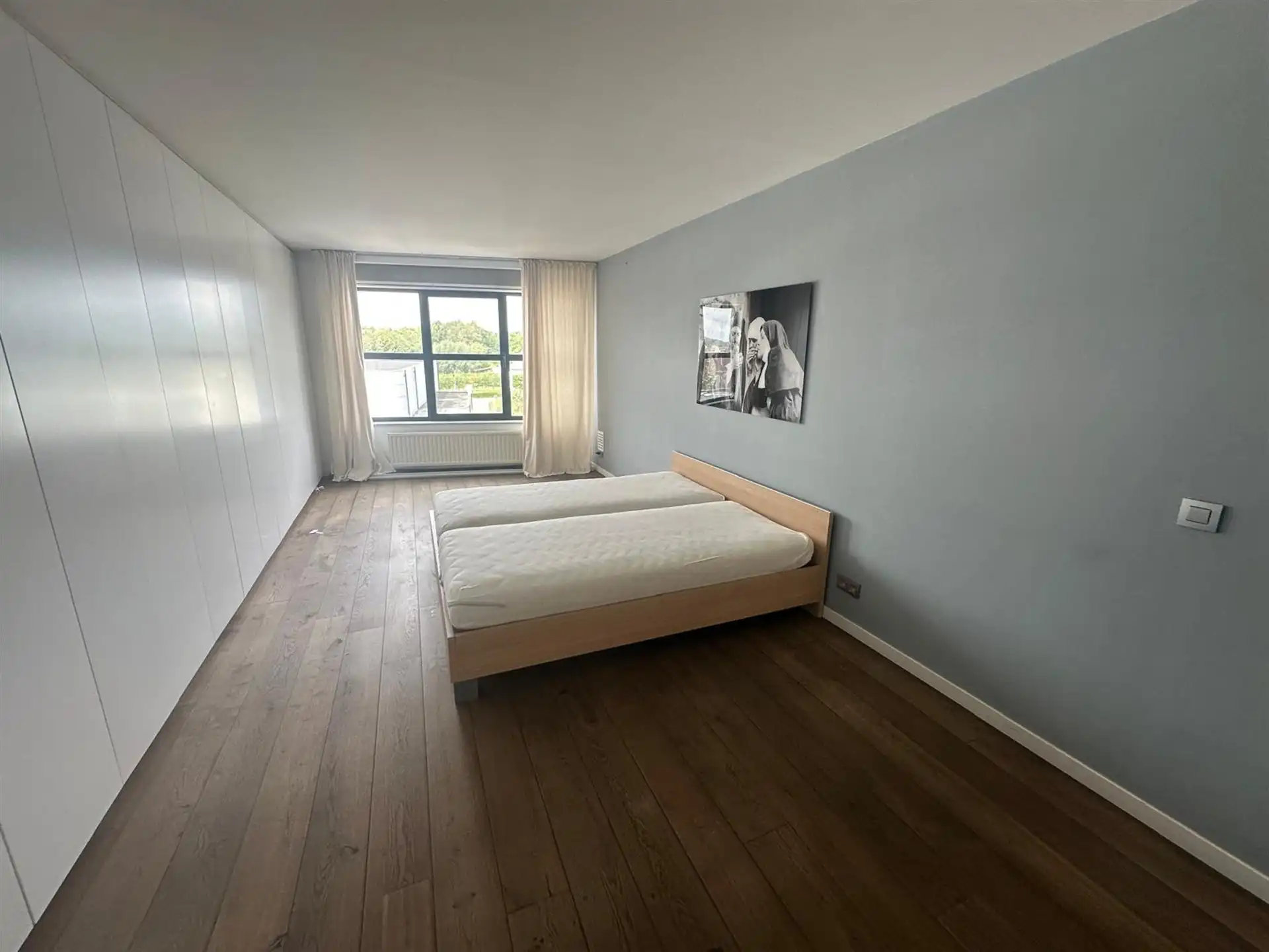 Stijlvol en lichtrijk appartement met twee terrassen en open uitzicht foto 12