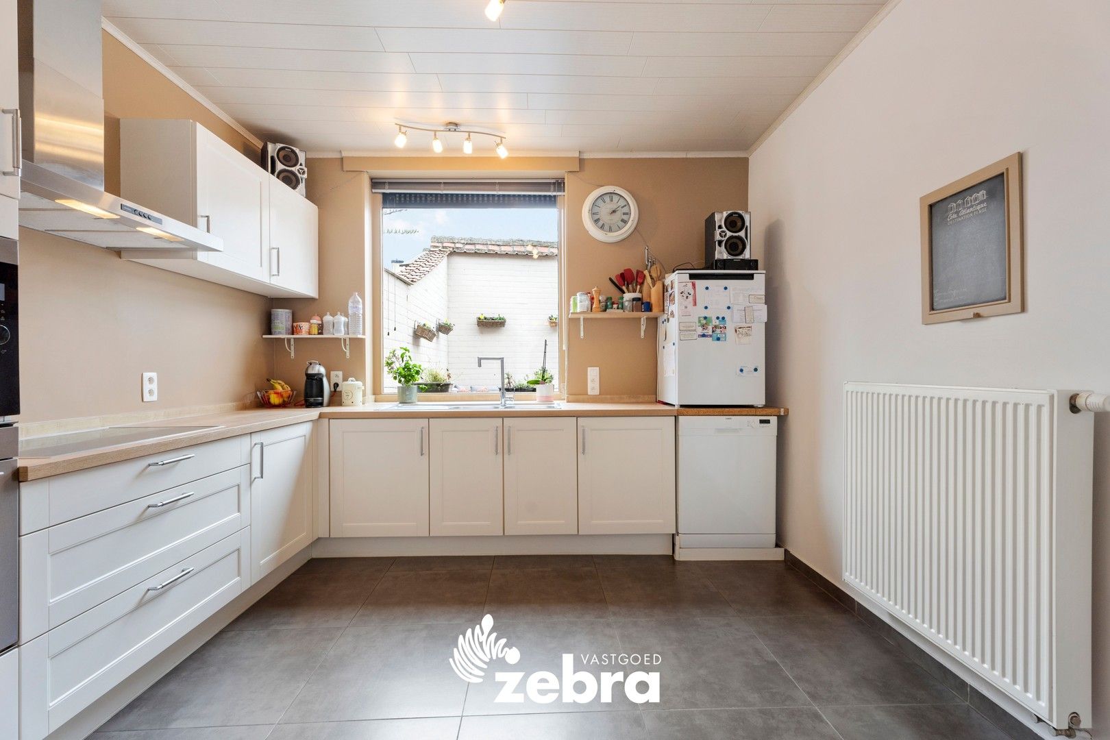 Instapklare woning met drie slaapkamers in Dentergem! foto 8