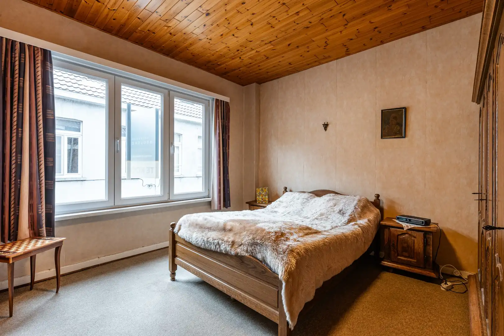 Te renoveren woning met verrassend veel ruimte, stadstuin en garagebox in Eeklo! foto 11