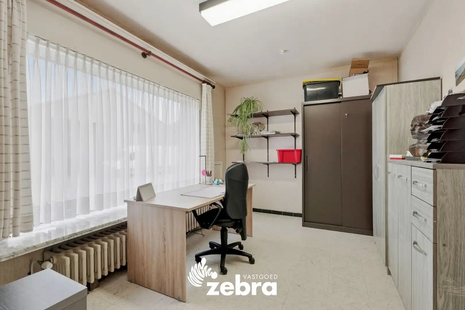 Ruime, energiezuinige woning met grote tuin, zwemvijver en schuur in Beveren aan de IJzer! foto 9