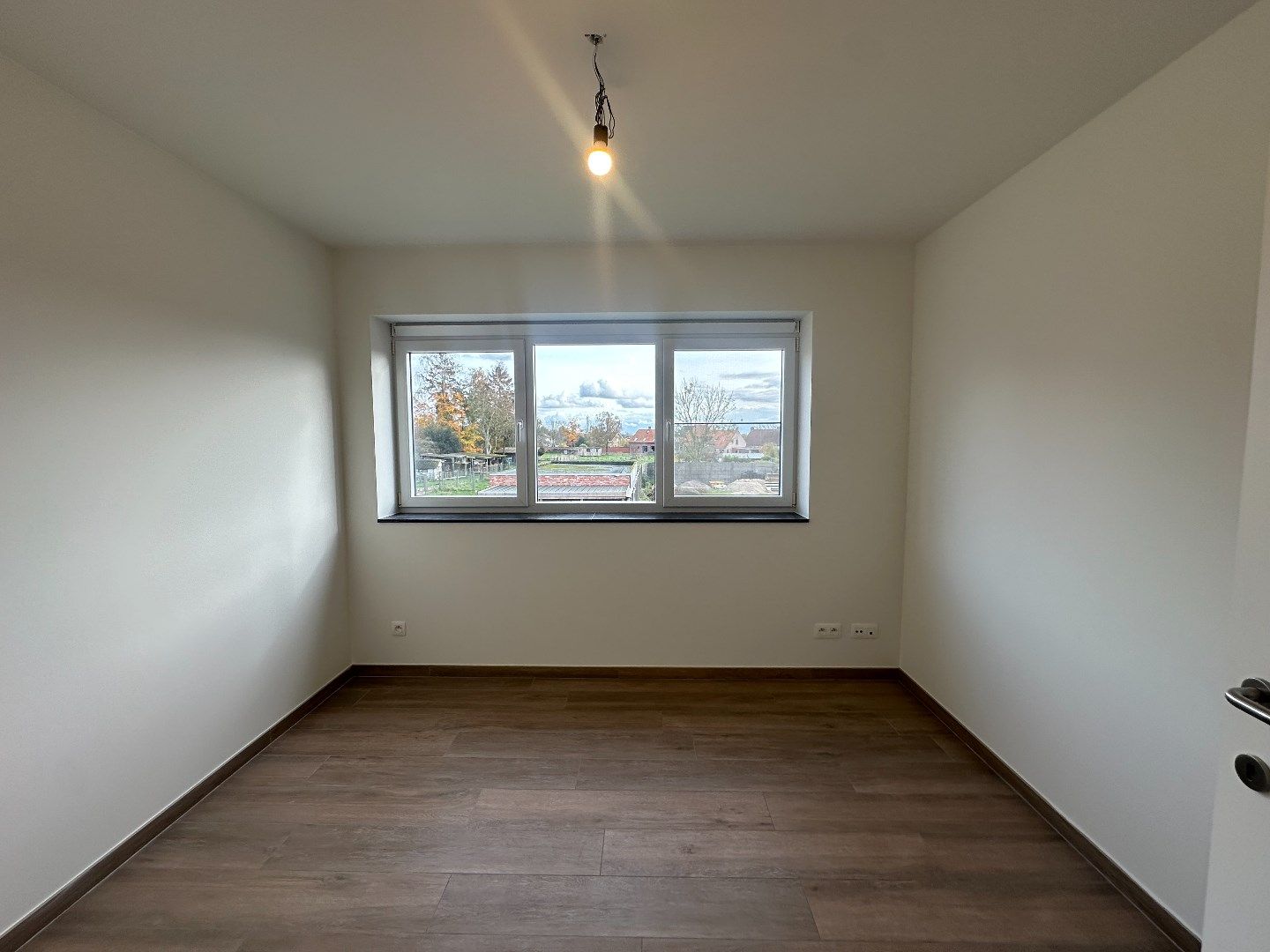 Ruim duplex-appartement met 3 slaapkamers en tuin te Werken foto 7