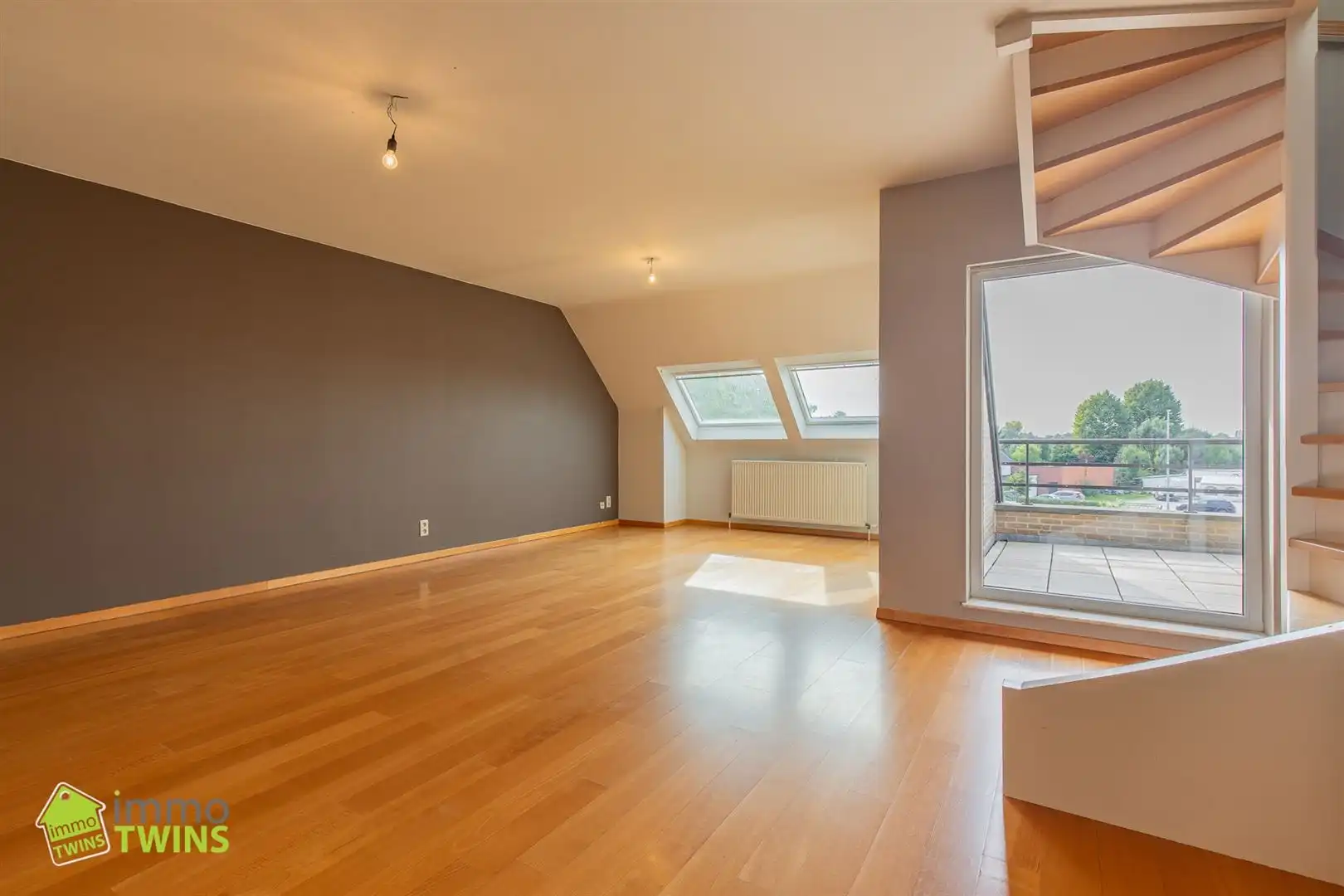 Duplex app. met 3 slpks, terras, autostaanplaats & garage foto 3