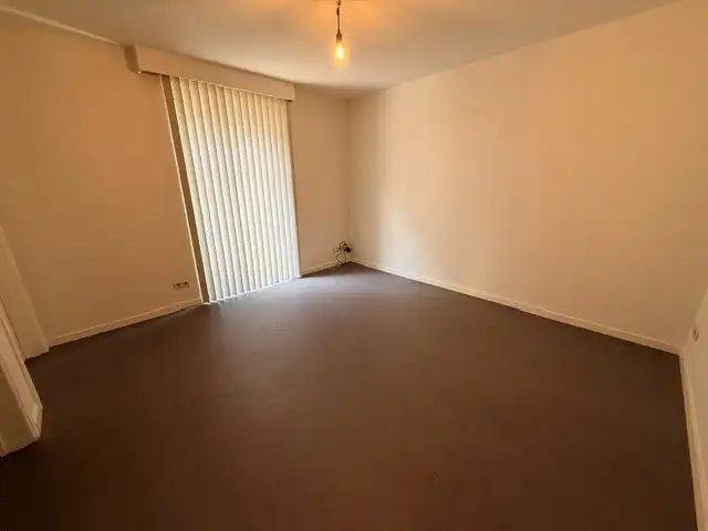 Verzorgd appartement met 1 slaapkamer, terras en lift in het centrum van Maaseik.  foto 7