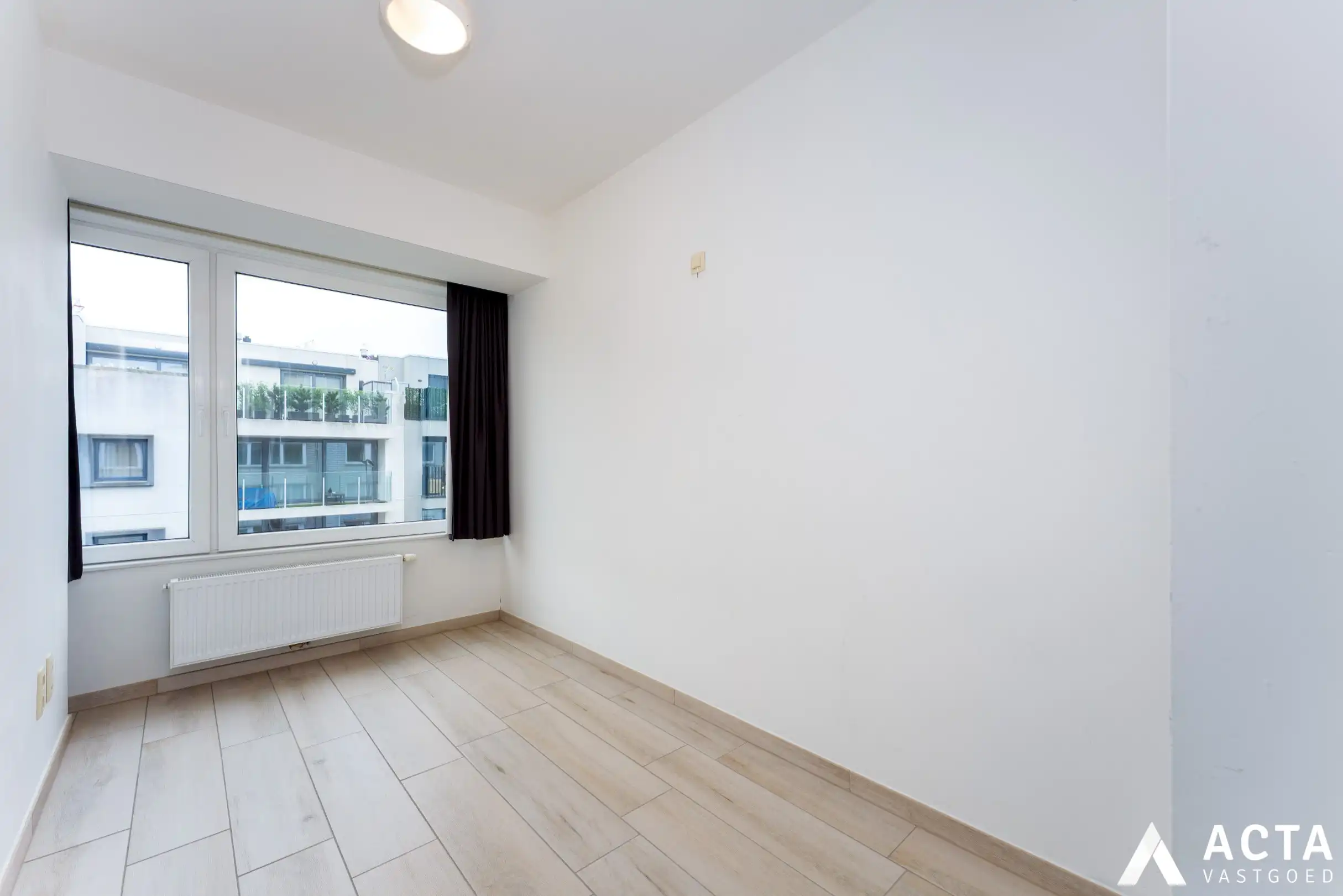 Instapklaar appartement met twee slaapkamers en parkzicht. foto 10