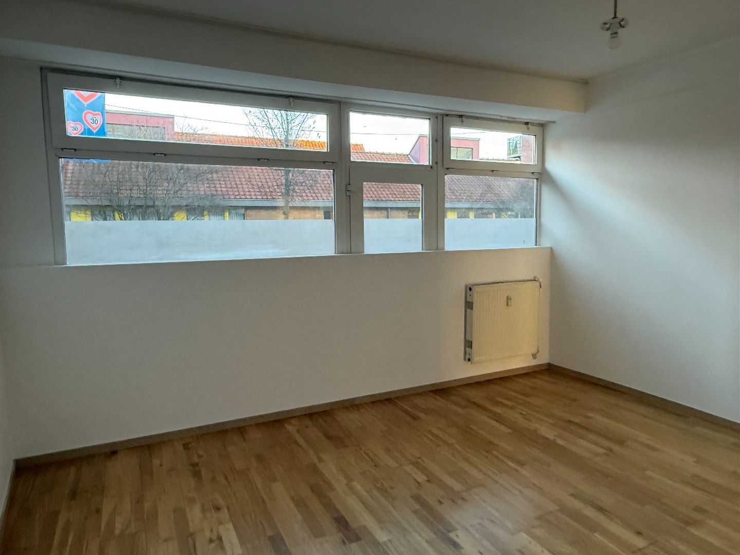 Verzorgd gelijkvloers 1-slpk appartement met tuin foto 16