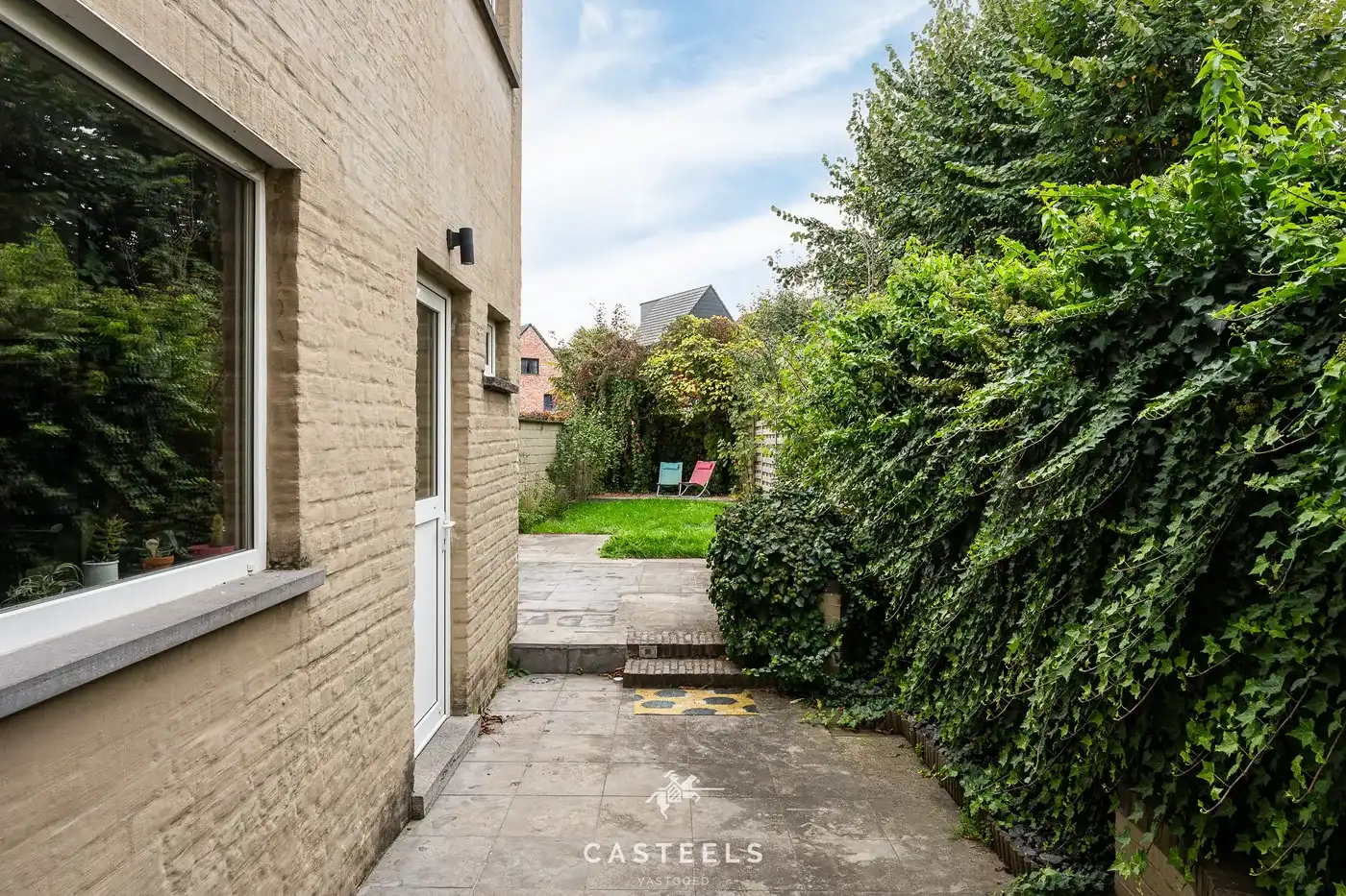 Centraal gelegen rijwoning met tuin in Sint-Denijs-Westrem foto 2