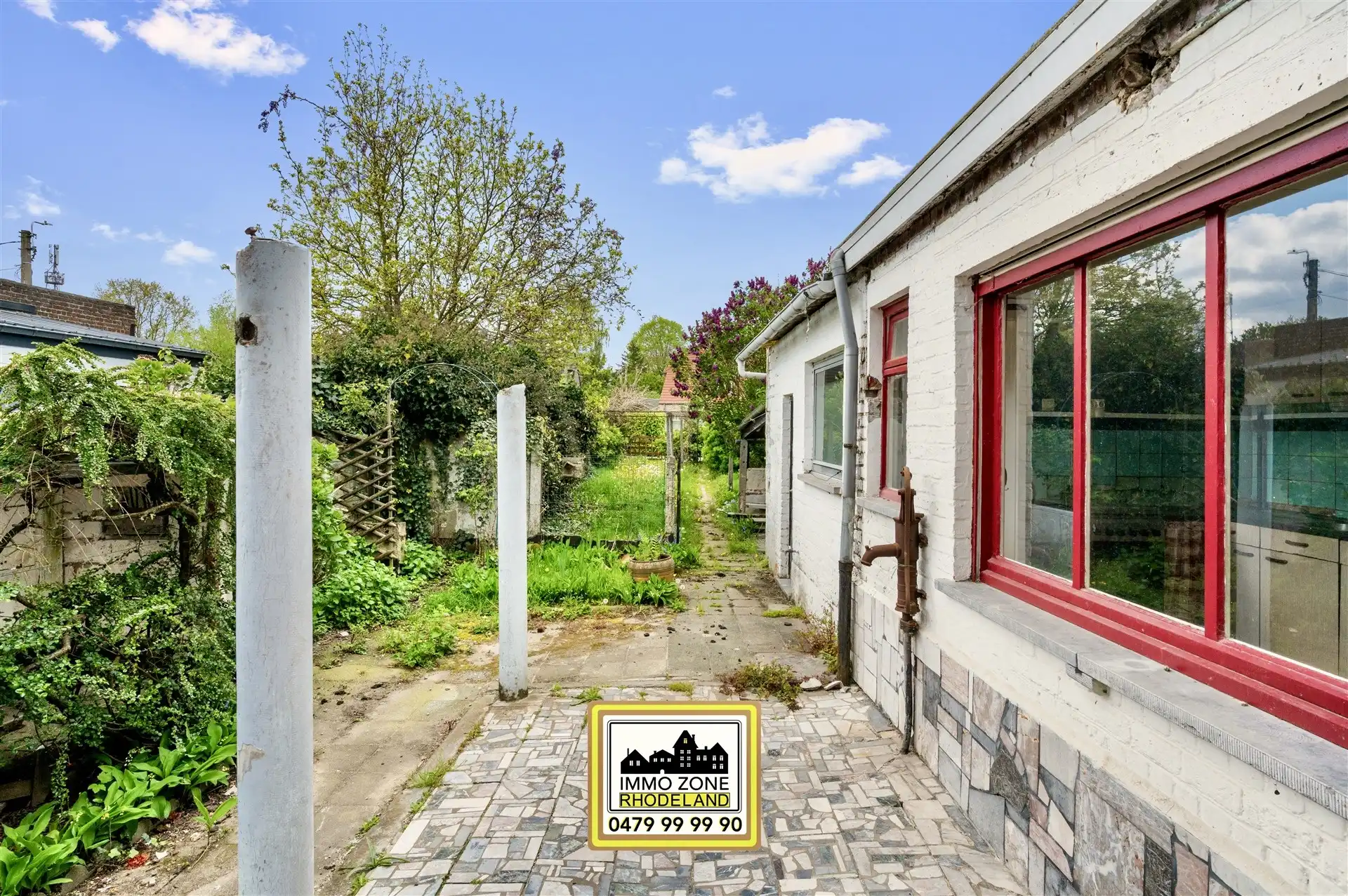 Te renoveren woning met rechtstreeks toegankelijke tuin foto 25