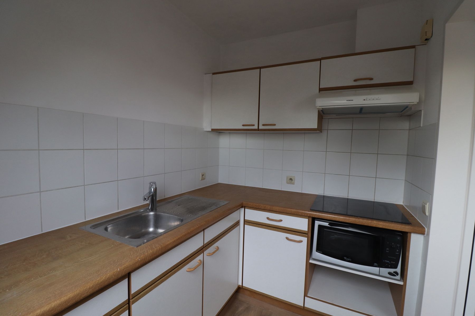 Recent gerenoveerd dakappartement met balkon, terras en garage. foto 5