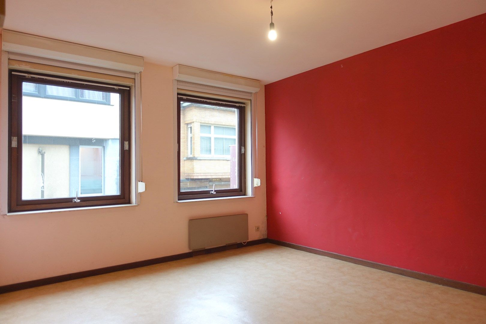 Opbrengsteigendom met 7 appartementen, 2 handelspanden en 7 garageboxen in Gistel foto 15