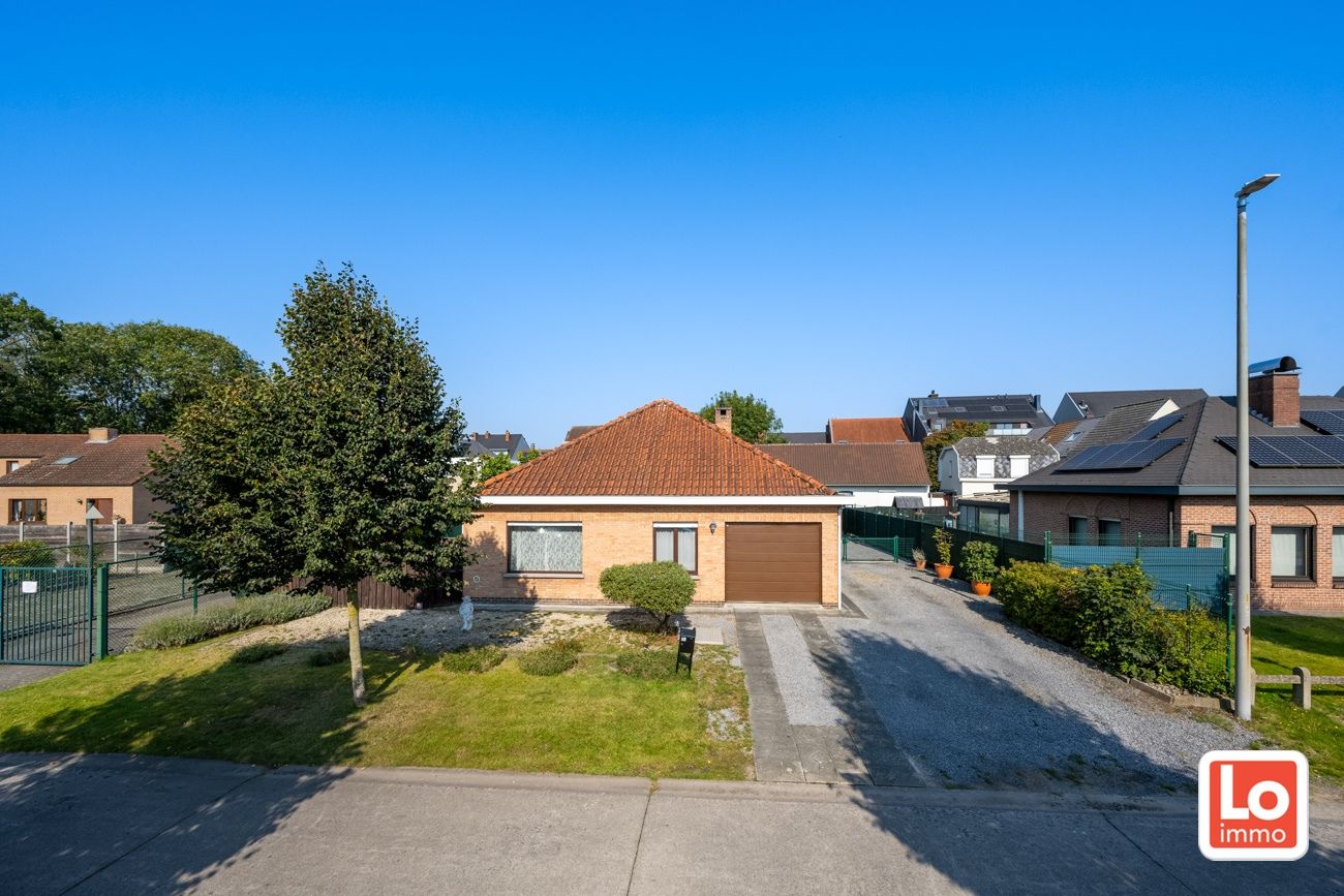 VERKOCHT! Degelijke open gelijkvloerse woning met inpandige garage en dubbele carport op een heel rustige locatie in het hartje van Lochristi! foto 21