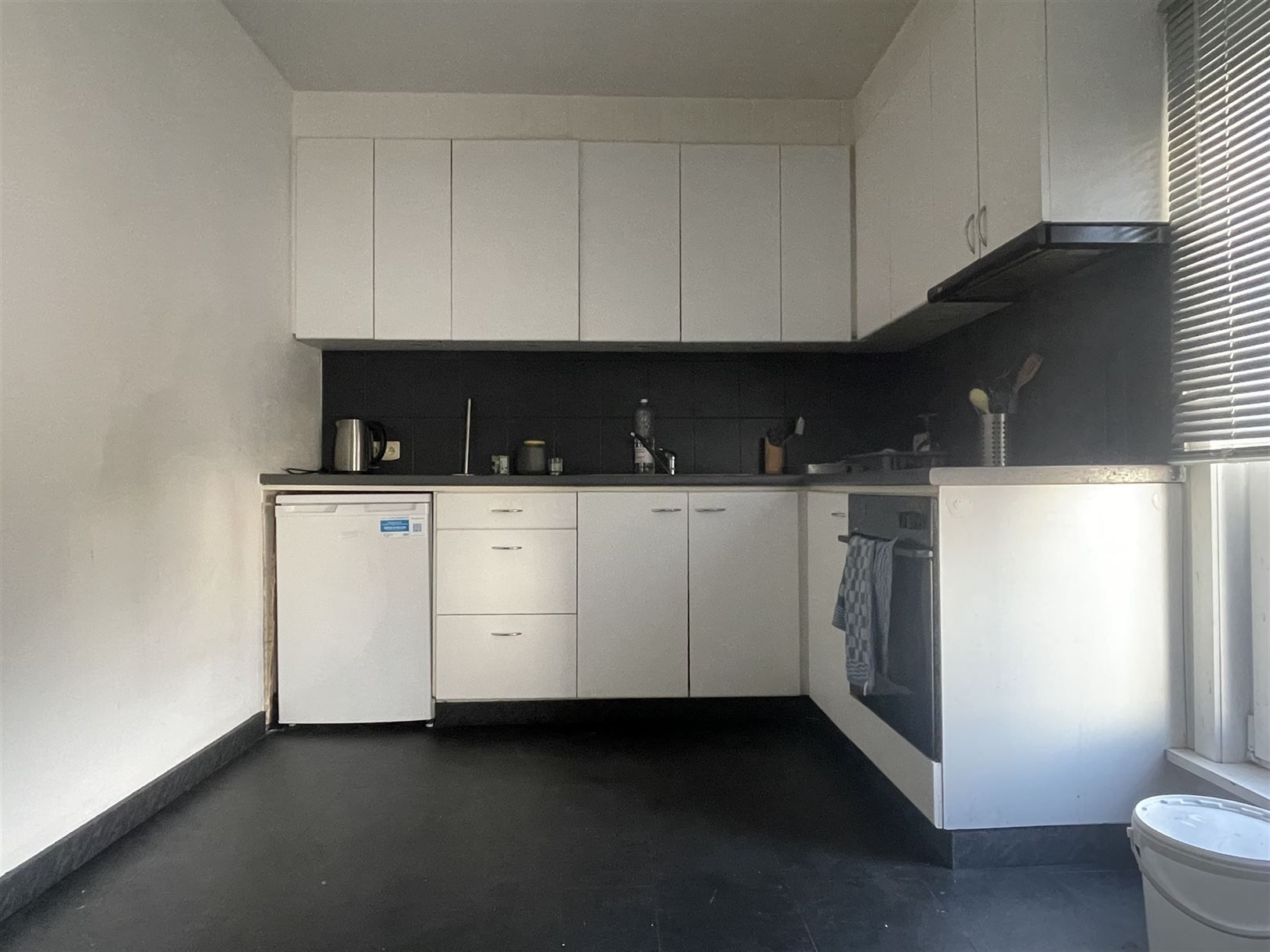 Instapklaar 2-slaapkamerappartement centrum Baasrode foto 4