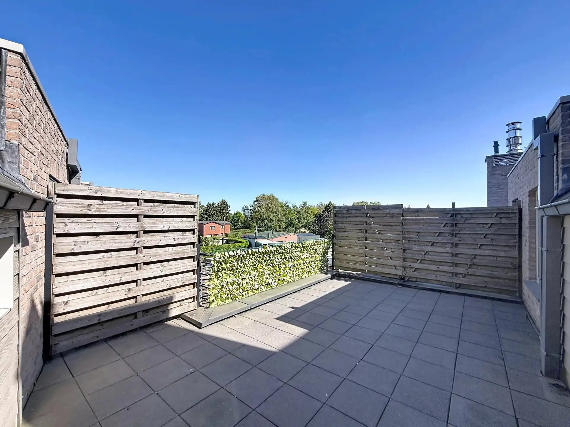 Duplex appartement met 2 slaapkamers, 2 terrassen en ondergrondse staanplaats en berging. foto 12