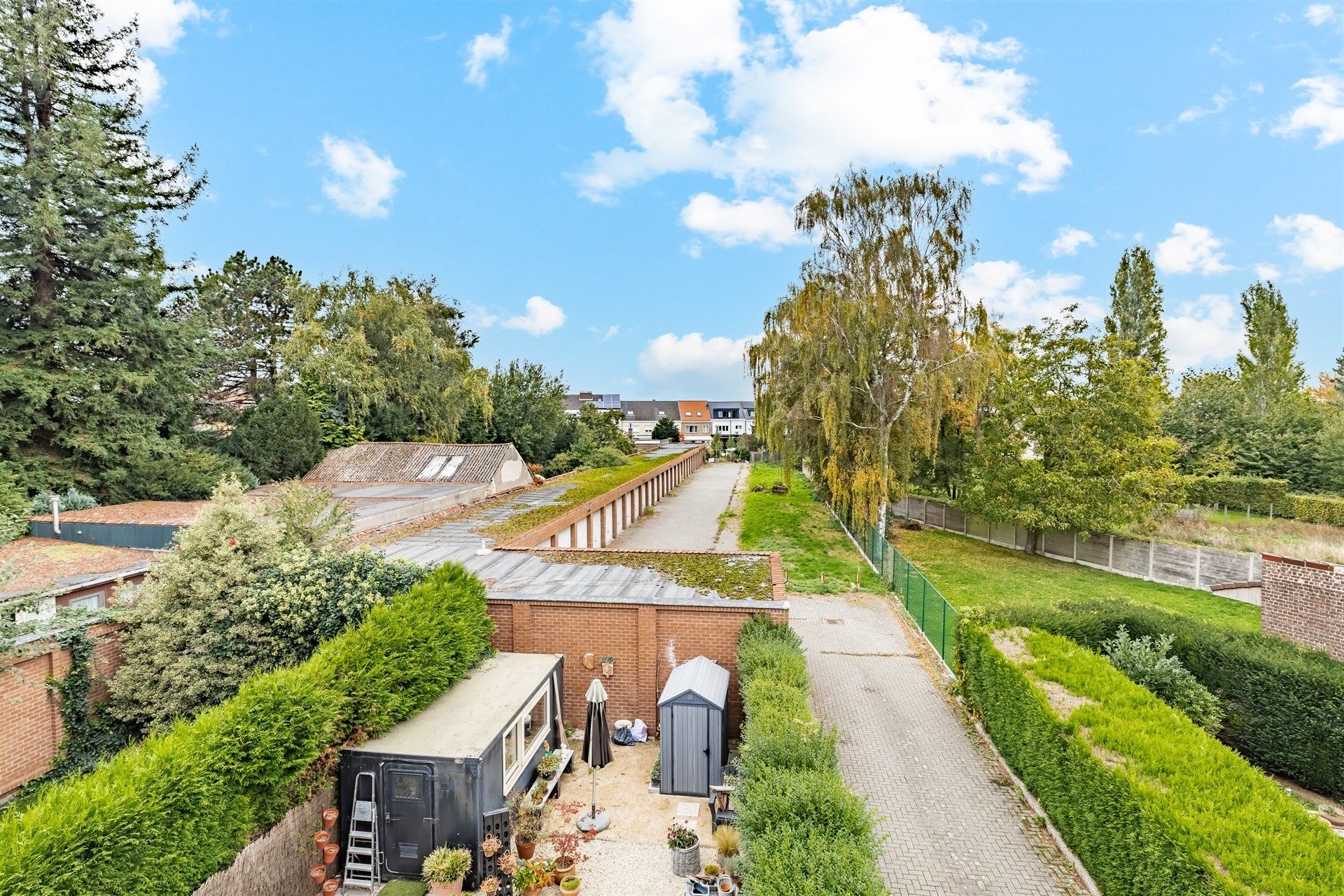 Opbrengsteigendom bestaande uit 6 ruime appartementen + 32 garageboxen foto 2