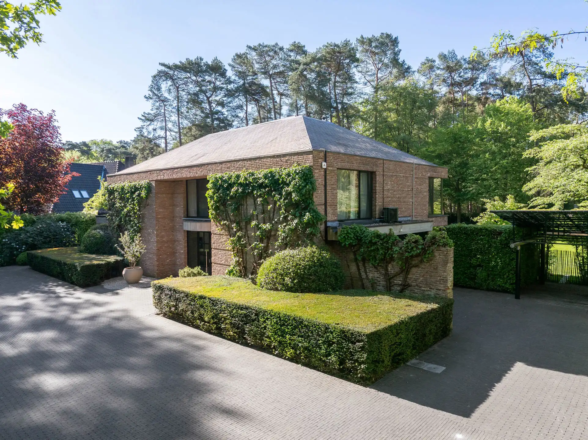 Architectenvilla met zwembad en ZW tuin in Hof Ter Linden foto 2