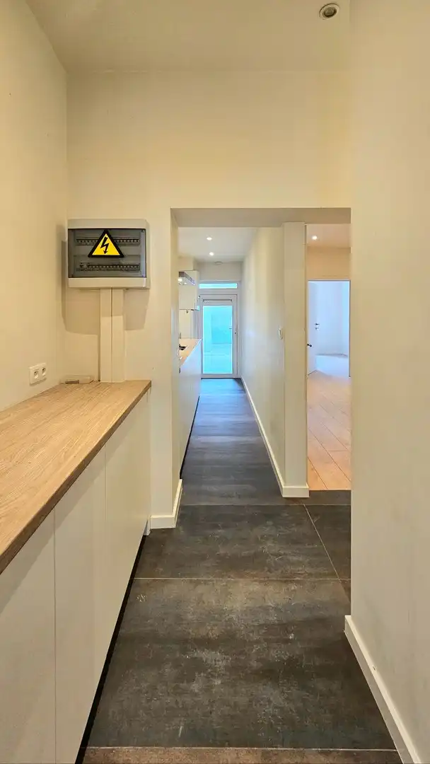 Appartement op het gelijkvloers met koer foto 6